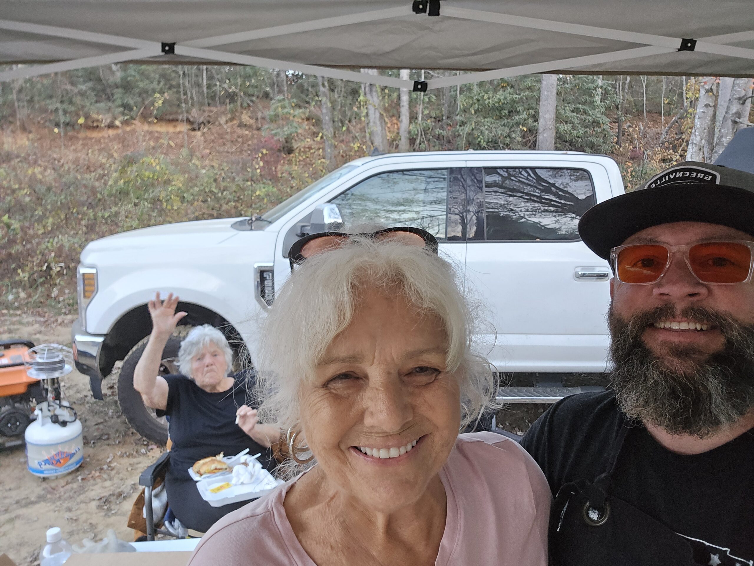 Help After Disaster volunteer with a community member